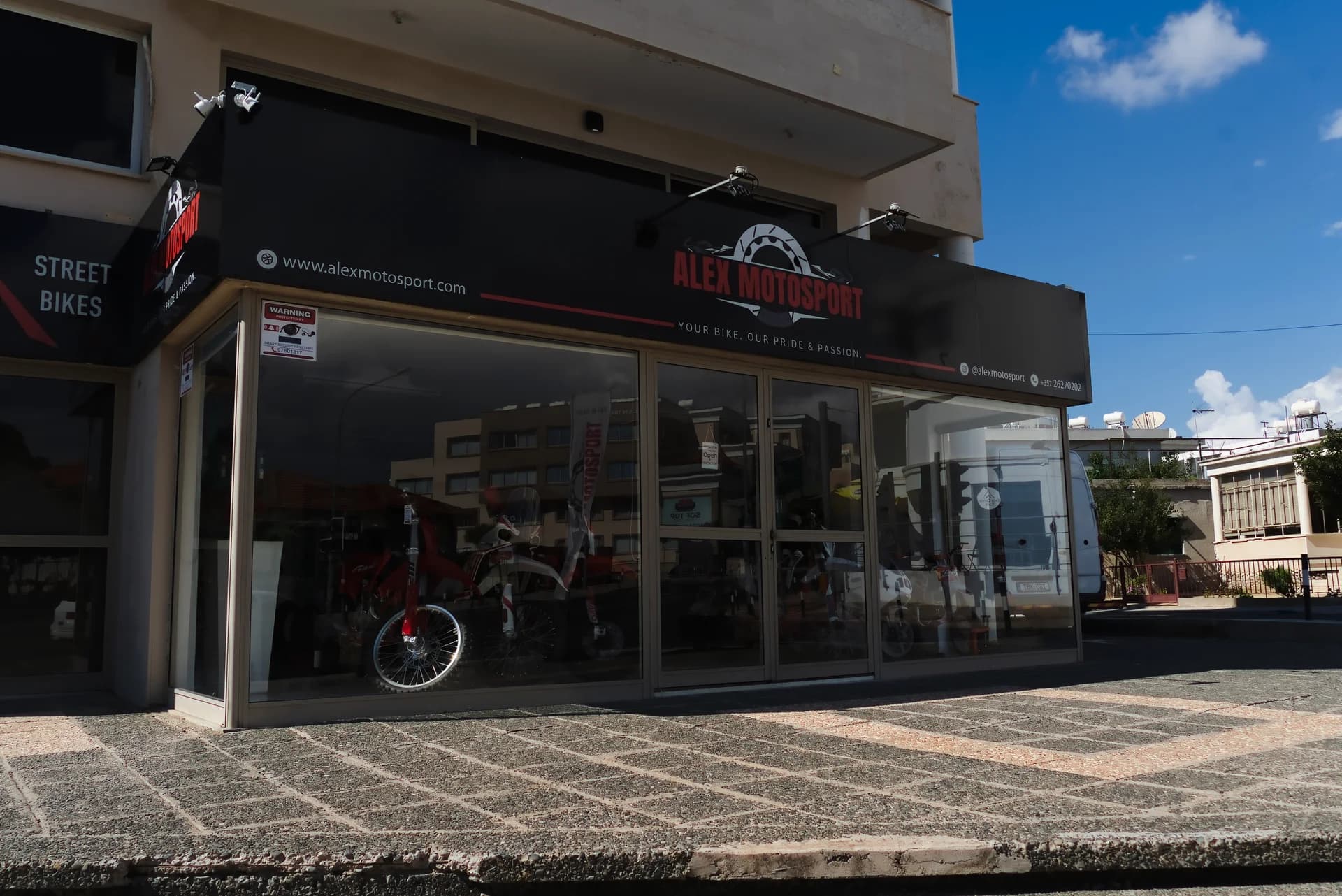 Alex Motosport storefront and entrance at the new Paphos shop